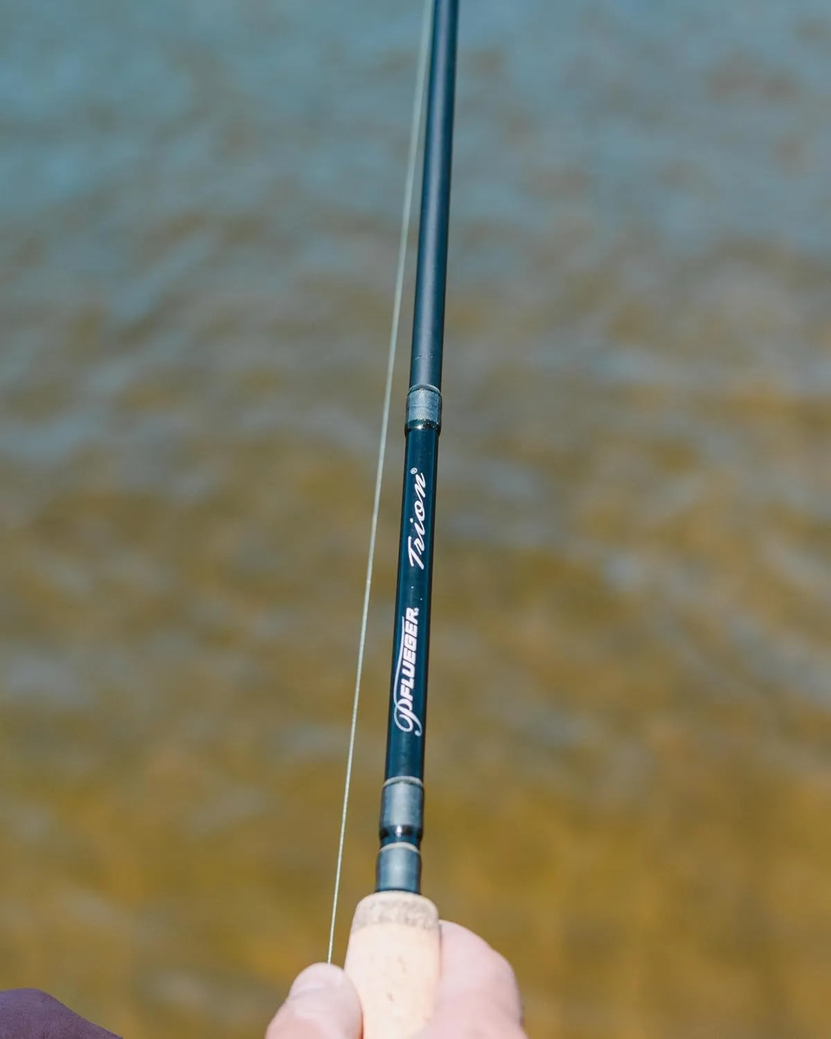 Pflueger Trion Spinning Rod and Reel Combo, 2-Piece Graphite Rod, Size Front Drag Reel, Right/Left Handle Position, Lightweight and Corrosion-Resistant, Aluminum Spool, Front Drag System